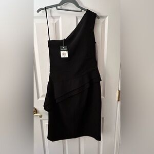 Black knee length cocktail dress.